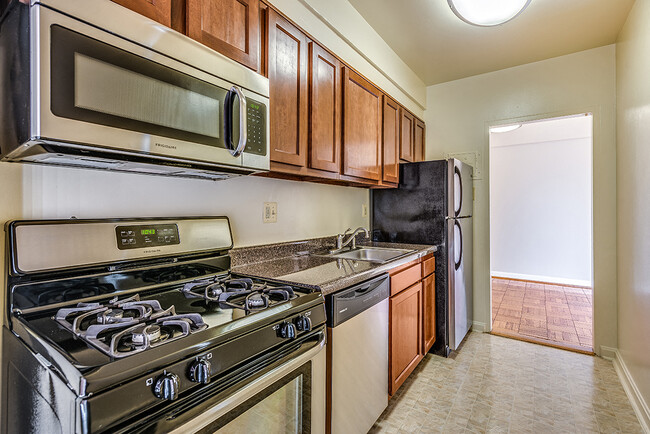 Renovated kitchen with stainless steel appliances - Idaho Terrace