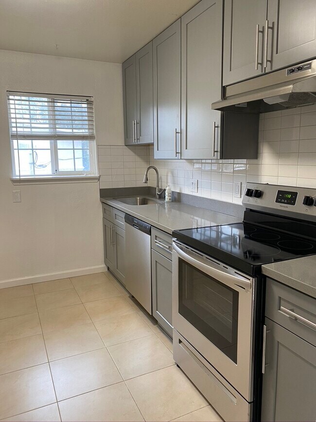 Newly renovated kitchen with stainless steel appliances - 191 Showers Dr
