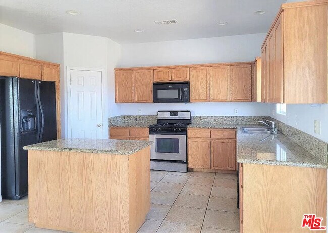 Building Photo - 8361 Jacaranda Ave