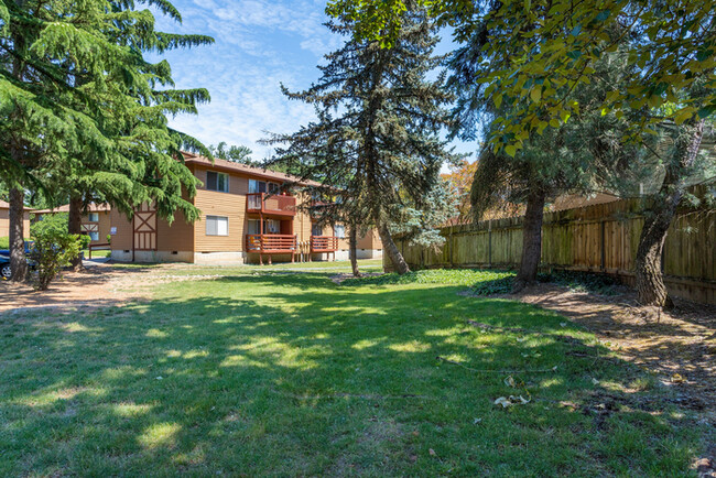Building Photo - Creek-side view with updated kitchen!
