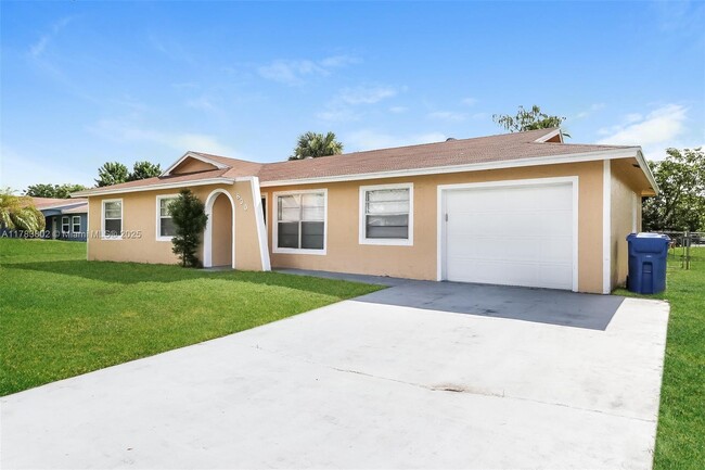 Building Photo - 830 Royal Palm Beach Blvd