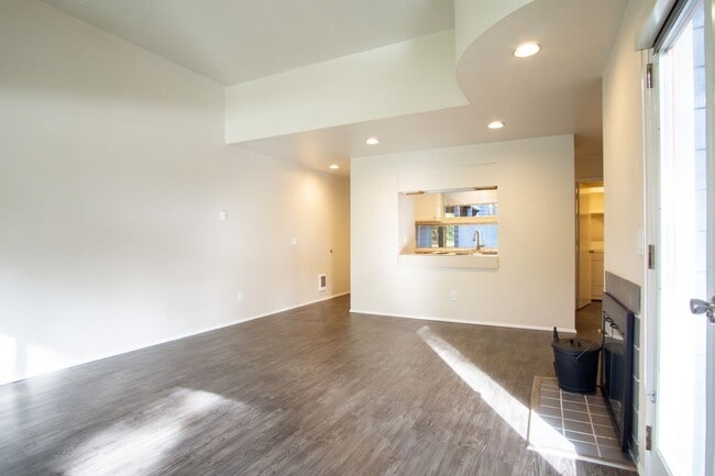 Building Photo - INCREDIBLE SPECIAL! Gorgeous & Bright 1-Bed w/ Wood-Burning Fireplace, W/D, & Private Patio!