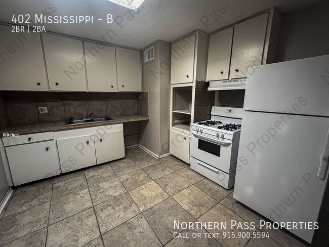 Building Photo - A Cozy 2-BDR, 2-BR Apartment! w/ Water Inc...