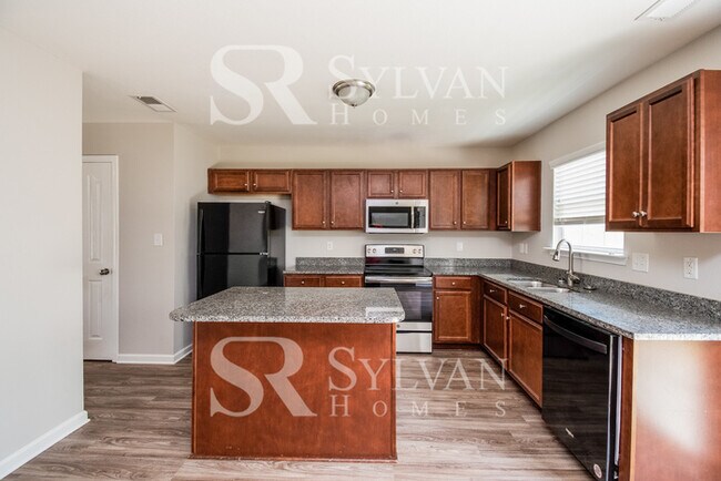 Foto del edificio - A must see 4-bedroom, 2.5 bath home in Oak Pointe.