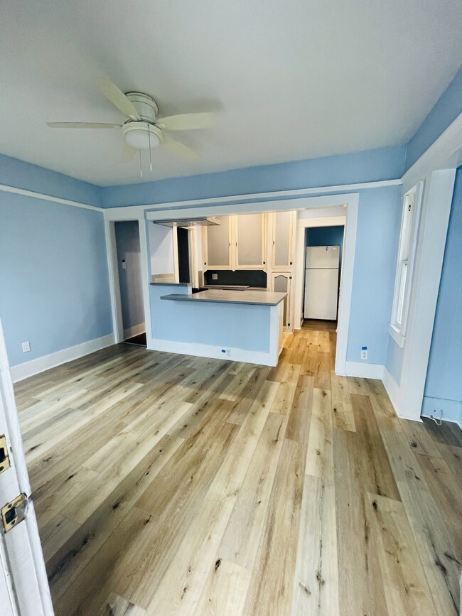 Entry through front door living room/open concept kitchen - 1712 E 8th St