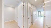 This contemporary apartment, located at 1224 M St NW in Washington DC, offers a well-designed living space of 690 square feet. The unit features two bedrooms, including a primary bedroom of 120 square feet, and two full bathrooms. The open-concept layout maximizes the use of space, creating a seamless flow between the living areas and kitchen.

Large windows throughout the apartment provide ample natural light and urban views, enhancing the sense of spaciousness. The kitchen is equipped with modern appliances, including a built-in oven and sleek cabinetry, perfect for culinary enthusiasts.

The flooring throughout is a light-toned hardwood, contributing to the bright and airy ambiance. Both bathrooms are finished with modern fixtures and neutral tones, featuring a combination of tile and marble-like surfaces.

Recessed lighting is installed throughout, offering adjustable illumination options. The bedrooms are generously sized, with the second bedroom suitable for use as a guest room or home office.

Storage space is optimized with built-in closets, ensuring a clutter-free living environment. The overall design aesthetic is clean and minimalist, with crisp white walls and contemporary finishes, making it an ideal canvas for personal style.