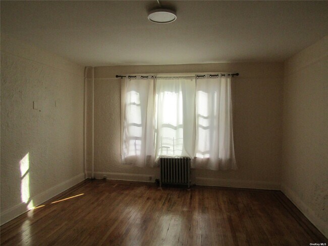 Building Photo - 221-15 Hempstead Ave