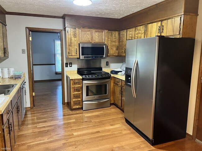 Building Photo - 3 br, 2 bath House - 5813 Pettigrew Drive