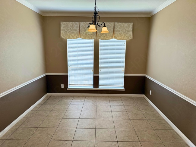 Building Photo - 7414 Carriage Bay