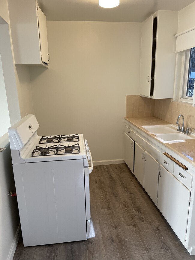 Kitchen, stove included - 10235 Mountair Ave