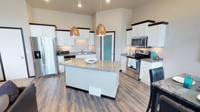 Cocina de tres niveles - Diamond Creek Townhomes