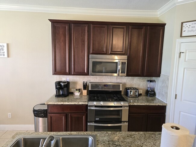 Building Photo - 7596 Assembly Ln