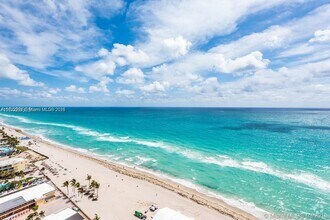 Building Photo - 18201 Collins Ave