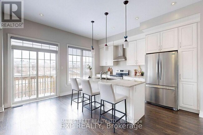 Photo du bâtiment - 50 Sharonview Cres