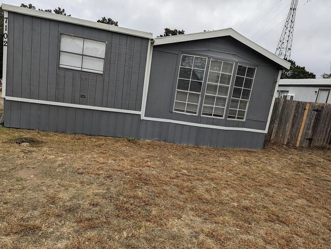 Building Photo - 7102 Cowpoke Trl
