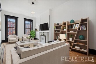 Building Photo - Timelessly Renovated Historic Triplex with...