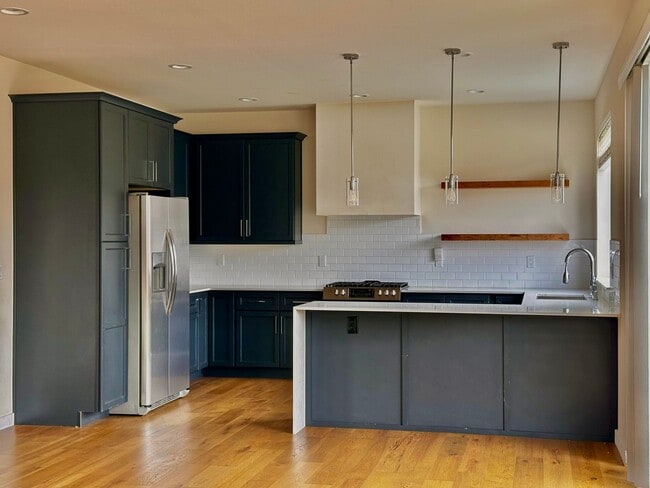 Building Photo - Stylish 4BR | 3BA Home with Den, Fenced Ba...