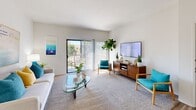 Located at 1142 Buckingham Dr in Costa Mesa, CA, this well-appointed one-bedroom, one-bathroom residence offers a thoughtfully designed single-level layout with comfortable living spaces throughout. The bright living room features plush carpeting and a sliding glass door that opens directly onto a private balcony, offering outdoor views and abundant natural light. The open-concept kitchen and dining area are highlighted by crisp white cabinetry, granite-style countertops, wood-look flooring, a gas range, and a built-in dishwasher. A dedicated dining nook with a large window and modern chandelier provides a welcoming spot for meals. The generously sized primary bedroom is carpeted and filled with natural light from a wide window, complemented by a spacious walk-in closet with wrap-around hanging rods. The full bathroom includes a granite-style vanity with ample counter space, white cabinetry, a large wall mirror, and a shower-tub combination. Additional features include in-unit laundry, multiple closets for storage, and a hallway connecting the main living areas. The residence combines functional design with a bright, airy ambiance well-suited to Southern California living.