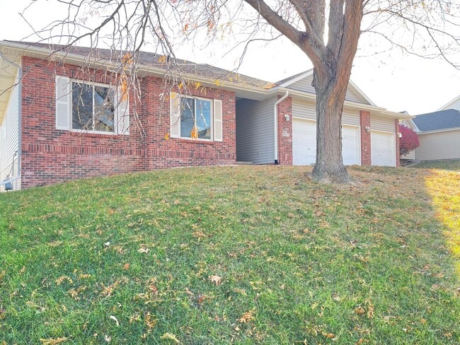 Photo - Northwest Omaha Gem: 2,700 Sq Ft, 3-Bedroom, Walk-Out Finished Basement, Fenced Yard, 3-Car Garag... House