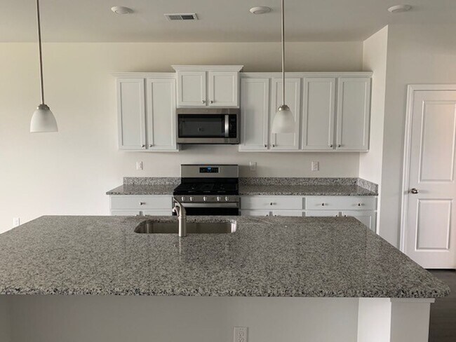Building Photo - 5025 Magnolia Village Way
