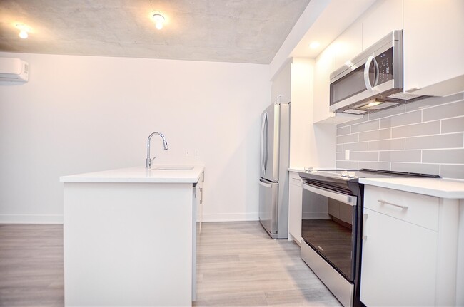 Photo du bâtiment - 1-1404 Av. de la Gare