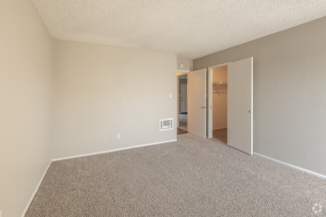 2BR, 1BA - 920SF - Primary Bedroom - Newport Village Apartments