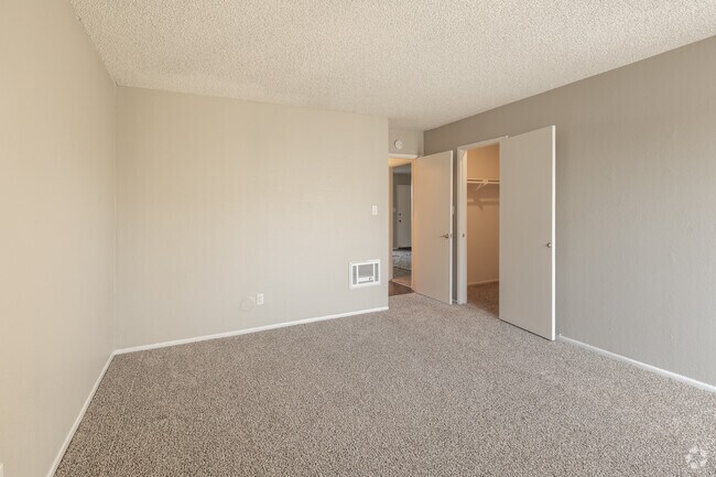 2BR, 1BA - 920SF - Primary Bedroom - Newport Village Apartments
