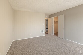 2BR, 1BA - 920SF - Primary Bedroom - Newport Village Apartments