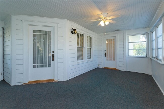 Photo - Run don't walk for this one of a kind beautifully maintained Old Florida Charmer on a park like d... House