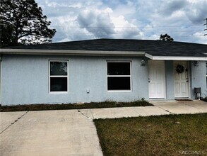 Building Photo - 9437 N Travis Dr