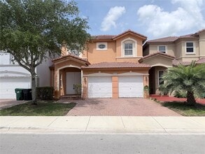 Building Photo - 8720 NW 111th Ct