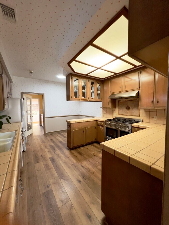 Kitchen view from living room - 729 Border Ave