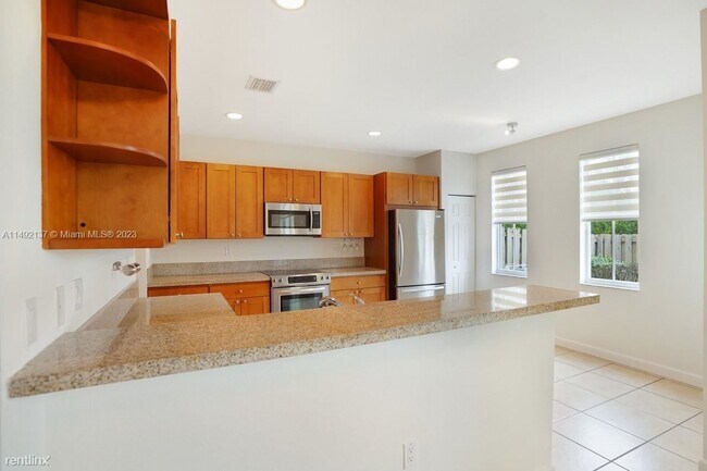 Building Photo - 4 br, 3.5 bath House - 7418 NW 108th Path