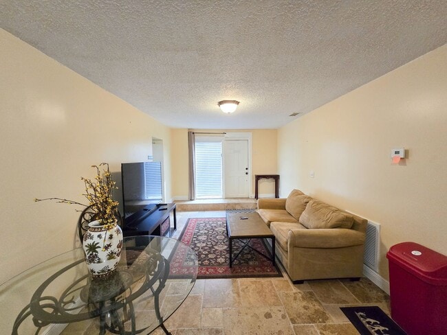 Building Photo - OCEANFRONT FURNISHED ANNUAL ONE BEDROOM ONE BATH