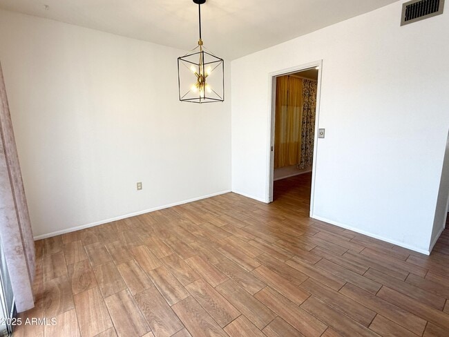 Building Photo - 10223 W Andover Ave