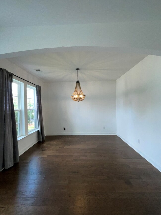 Building Photo - "Spacious 4-Bed Oasis with Stunning Lake V...