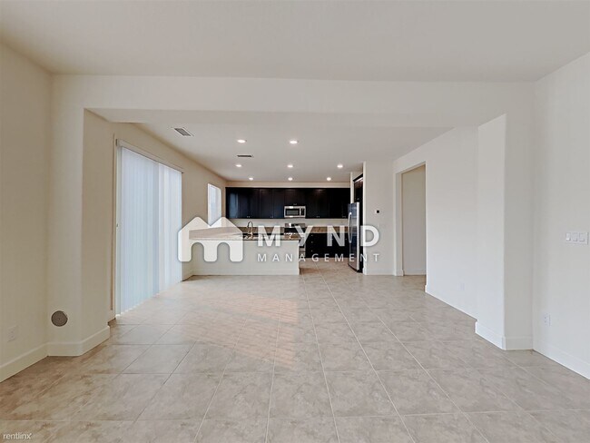 Building Photo - 4 br, 3 bath House - 9760 Quartette Dr