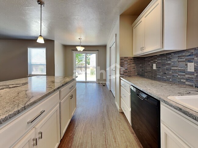 Foto del edificio - 9860 W Mossywood Dr