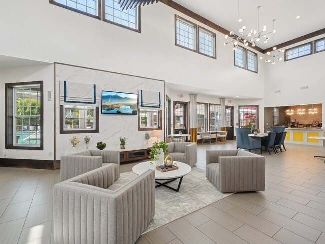 Spacious resident clubhouse and modern community gathering spaces at Village at Broadstone Station in Apex, North Carolina - Village at Broadstone Station