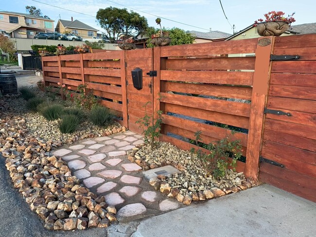 Gate from street view - 619 Stork St