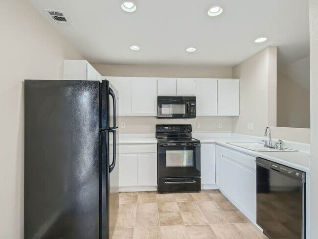 Building Photo - Evolve Real Estate: AVAILABLE JULY 5, 2026! Bright 2 Bedroom + 1 Car Attached Garage Home!