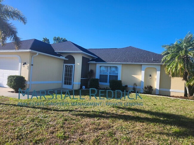 Building Photo - 3 BED 2 BATH SINGLE FAMILY HOME ON FRESH WATER CANAL WITH DOCK