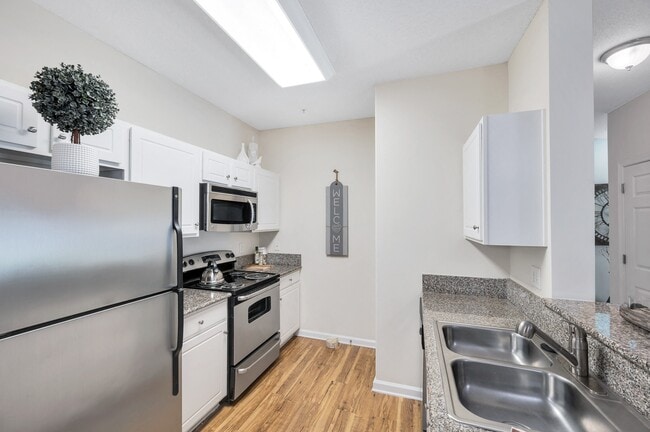 Foto del edificio - Rivermont Crossing Townhomes & Apartments
