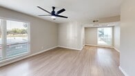 Located at 4425 Gilbert Ave in Dallas, TX 75219, this one-bedroom, one-bathroom unit offers a well-designed single-floor layout. Light wood-look flooring runs consistently throughout the space, creating a clean and cohesive look that ties each room together.

The living room is bright and open, benefiting from a large window that allows natural light to fill the area. A sleek ceiling fan with integrated lighting adds both function and style. The space flows naturally toward the kitchen, making it well-suited for everyday living and entertaining.

The galley-style kitchen is efficiently designed, featuring granite countertops, crisp white shaker cabinets, a stainless steel sink with a modern pull-down faucet, and stainless steel appliances including a range and refrigerator. A window at the end of the kitchen brings in additional natural light and ventilation.

The bedroom is a comfortable, well-proportioned retreat with its own ceiling fan, a window with outdoor views, and direct access to a hallway that connects to the closet and bathroom. The bathroom features a full soaking tub with clean white subway tile surround, offering a simple and timeless aesthetic.

A dedicated closet and hallway complete the layout, providing practical storage and easy navigation throughout the unit.