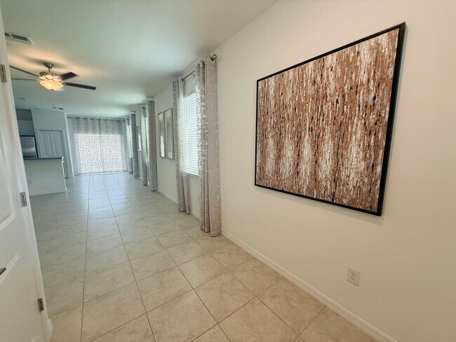 Foto del edificio - Townhouse in Land O' Lakes - The Townes at Lake Thomas