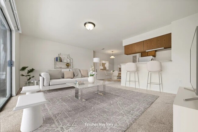 La sala de estar de Matthew - Prairie Lakes Apartments