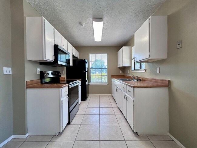 Foto del edificio - 1908 Rainy Meadows Dr