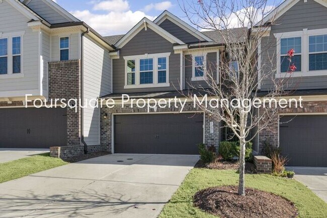 Building Photo - Townhome| Sunroom | 2- Car Garage | Washer...