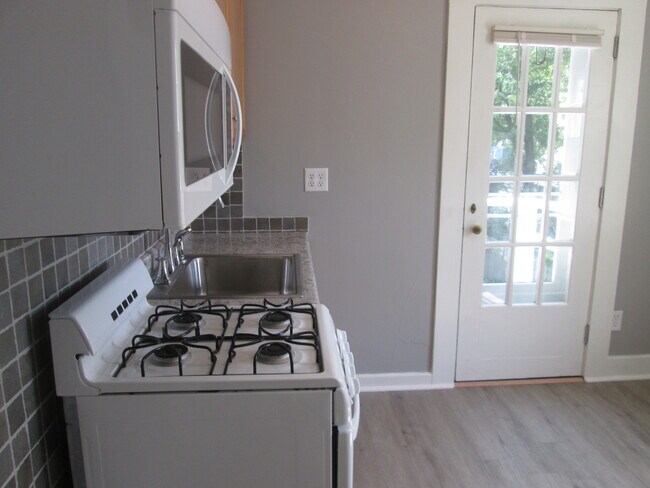 Brand new microwave w/fan & light - 501 N Sherman Ave