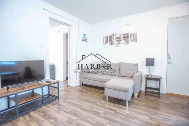 Foto del edificio - Modern Minimalism: Efficient 1-BR in a Top-Tier Location